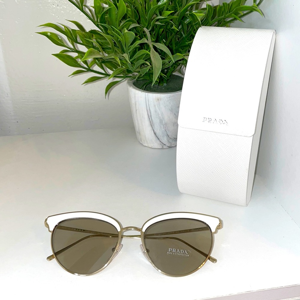Brand new Prada cat eye white and gold sunglasses .